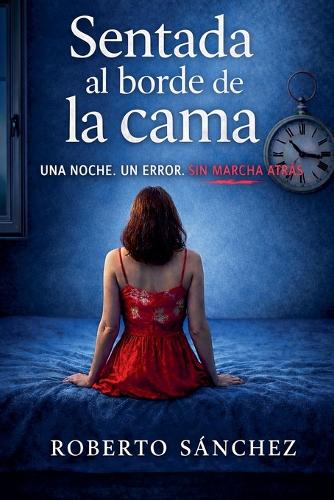 Sentada al borde de la cama